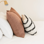 Pillows on Bed. sleep better. perform better online programme